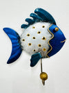 Handmade and hand painted metal fish hook in blue, silver, with gold detailing, mounted on a wall.