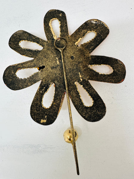 Back view of handmade turquoise flower hook.