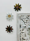 A handmade and hand painted mosaic glass daisy flower on a mdf base.