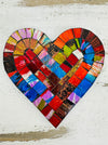 Single Fragaria heart mosaic coaster showing vibrant multicolour hand-painted glass pieces on a light background.