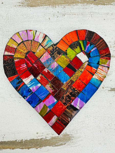 Single Fragaria heart mosaic coaster showing vibrant multicolour hand-painted glass pieces on a light background.