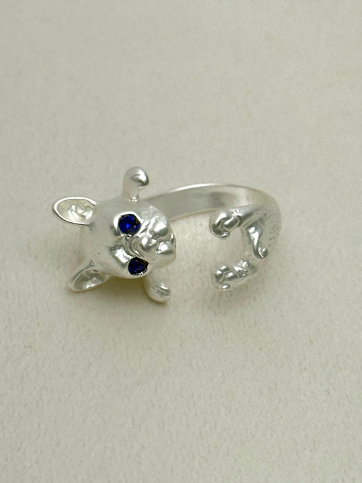 silver tone French bulldog puppy open ring with blue eyes on a white background