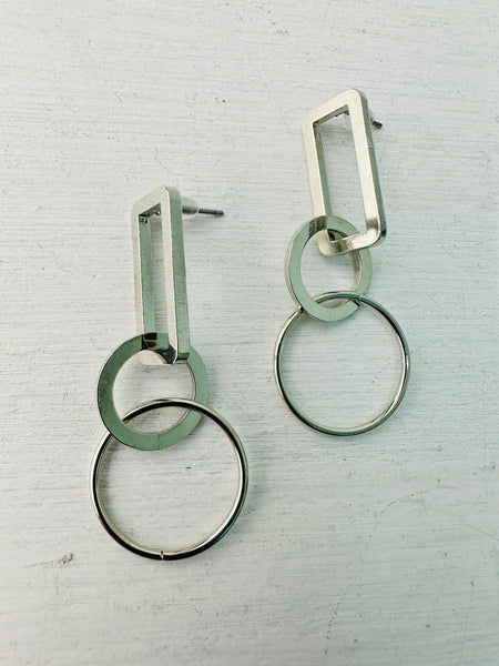 geometric silver drop earrings with rectangular and circular linked shapes