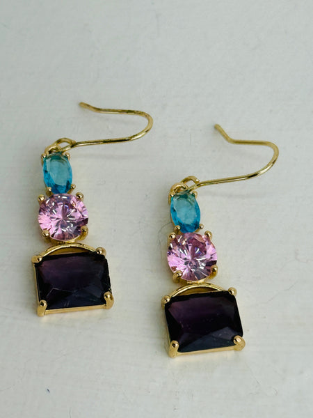 Elegant gold dangle earrings with faceted purple, pink and blue crystals.