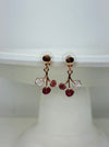 Rose-gold floral enamel drop earrings with gold tone finish, displayed on a white background.