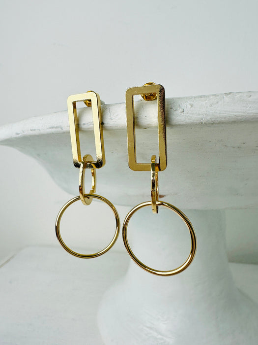 front view of gold geometric rectangle circle drop earrings 