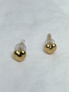 Gold heart-shaped earrings on a white background