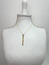 gold star necklace with multicolour gemstone drop pendant