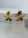 front view of gold-tone floral earrings 