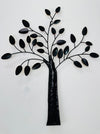 Back of metal tree wall art on a white background