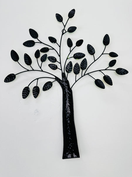Back view of metal tree sculpture showing branch and leaf structure