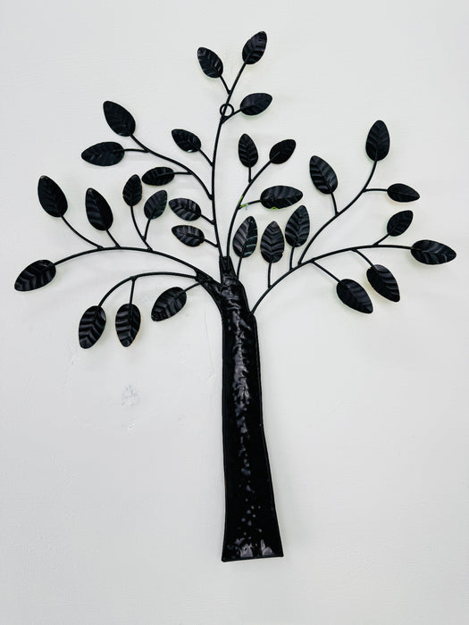 Back view of metal tree sculpture showing branch and leaf structure