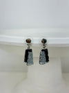 Grey and gunmetal rectangular enamel drop earrings with silver-tone outline, displayed on a white background.