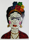 A mosaic glass portrait of Frida Kahlo with geometric patterns in various colors, predominantly featuring red, blue, and yellow, against a white background.