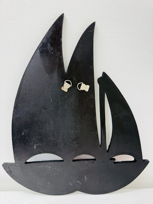 back view of mosaic glass boat wall art