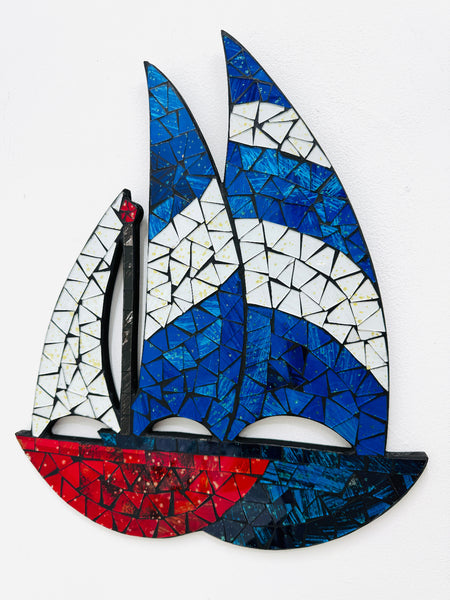 Mosaic sailboat wall art with blue, white, and red colors on MDF base