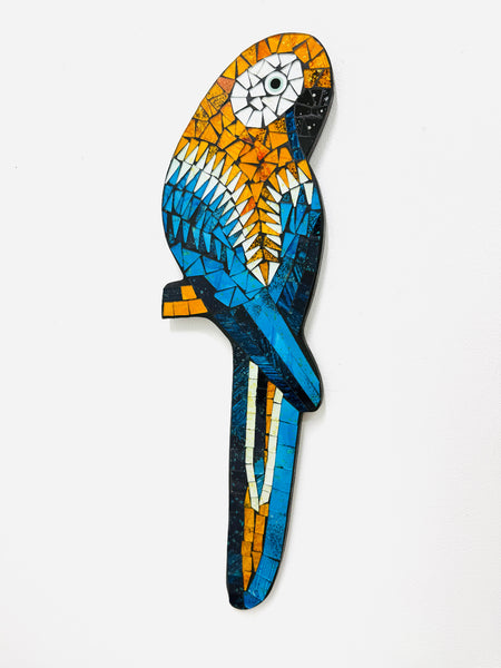 Mosaic parrot-shaped object on a white background