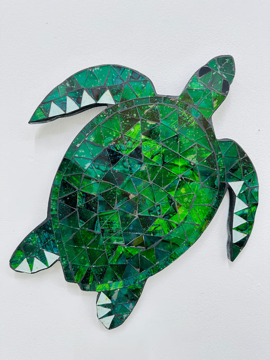 Handmade and hand painted mosaic glass turtle in shades of green on mdf base