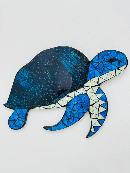 Handmade and hand painted mosaic glass turtle in shades of blue and turquoise on mdf base