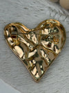 back of heart-shaped brooch