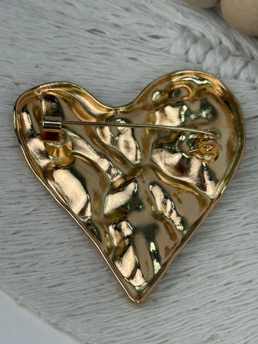 back of heart-shaped brooch