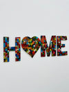 front view of HOME mosaic wall art with heart-shaped O in fragaria tones on MDF