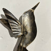 Back view of handmade copper humming bird wall hook.