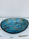aerial view of mosaic oval bowl on white background