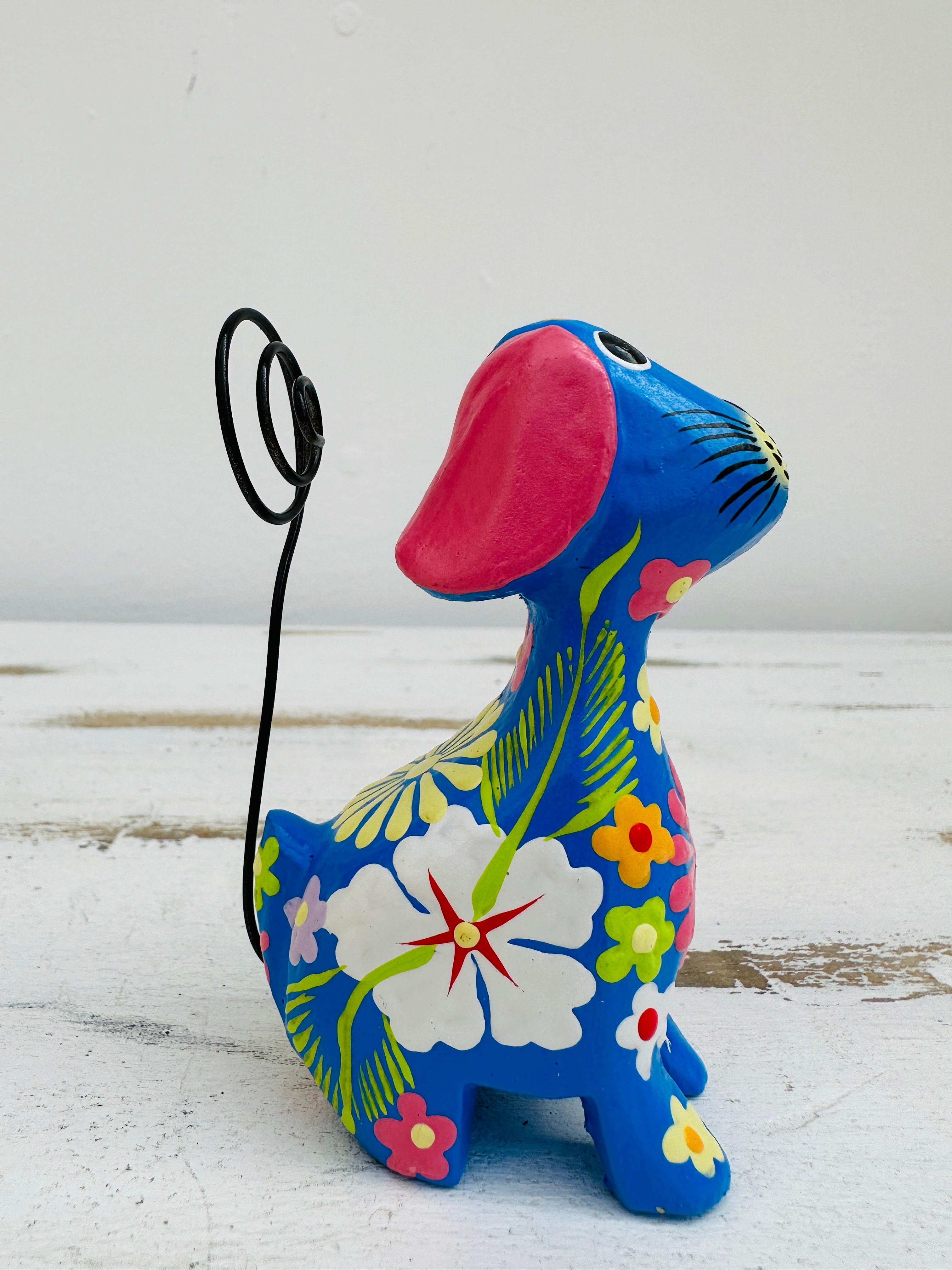 side close up of flower dog in blue