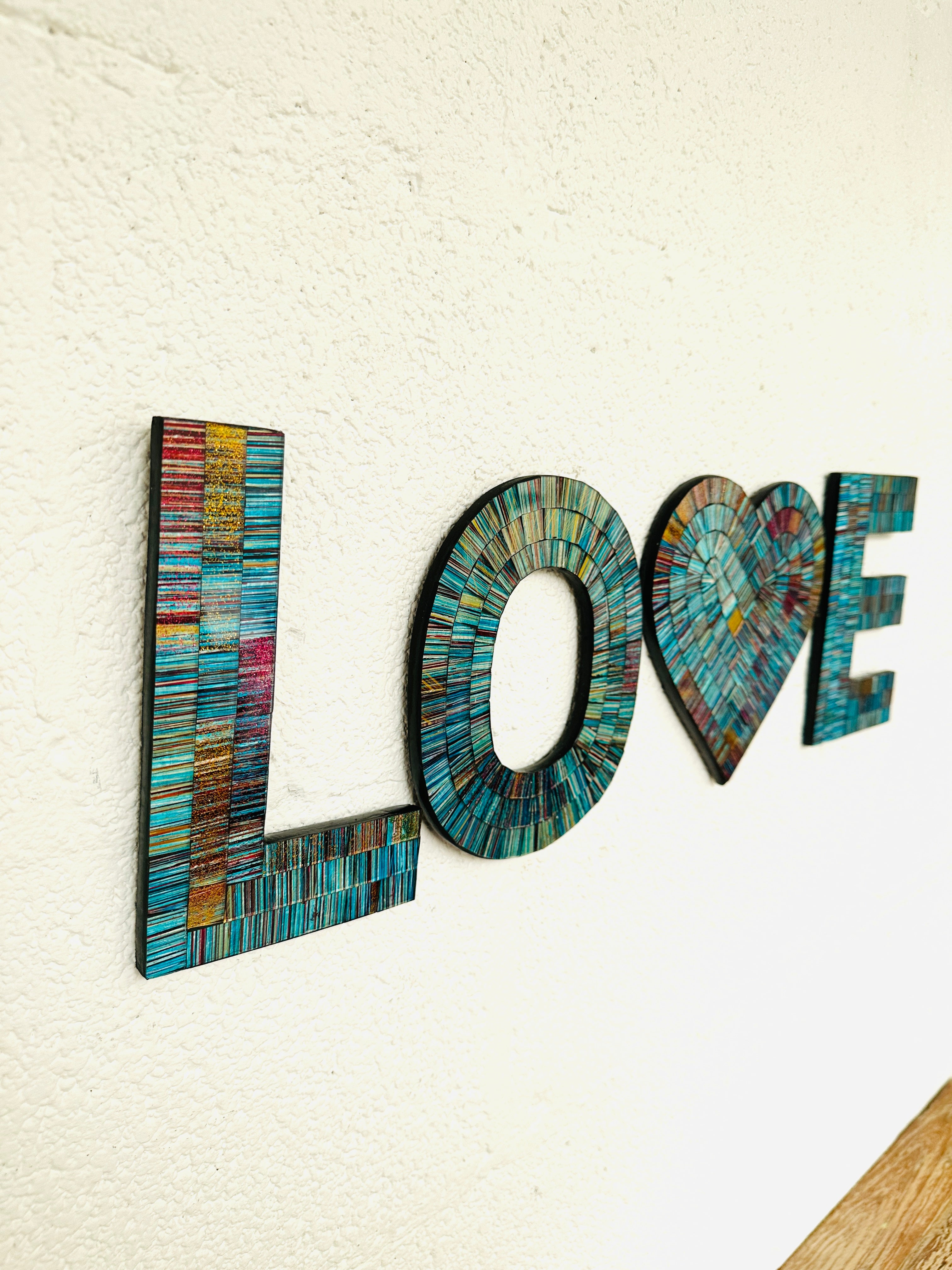 close side view of love mosaic sign