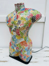 side view of mosaic man bust lamp with light off 