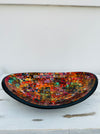 front view of mosaic oval bowl on white surface