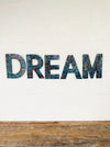 front view mosaic dream on white wall