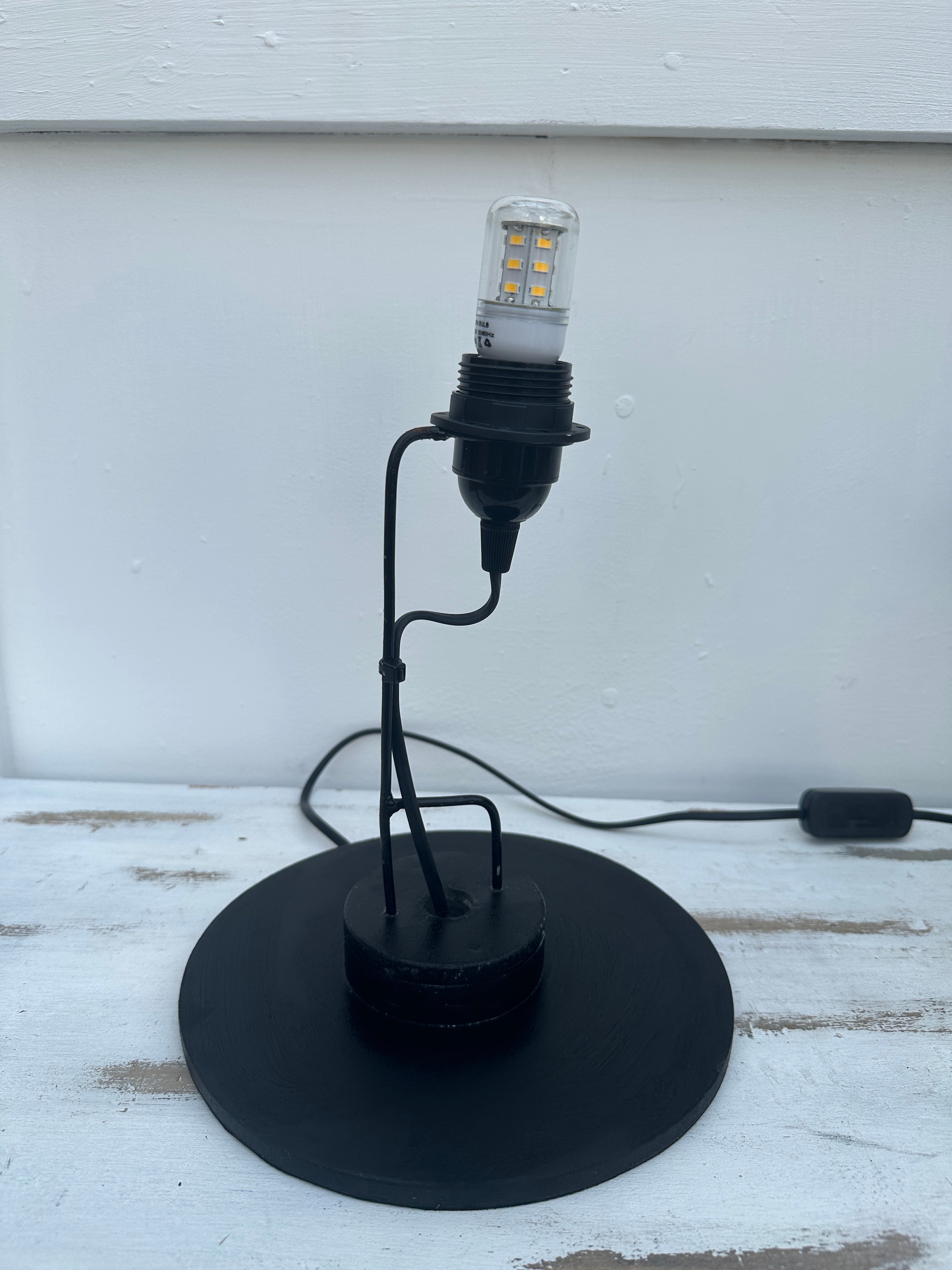 base and bulb view of mosaic cylinder lamp
