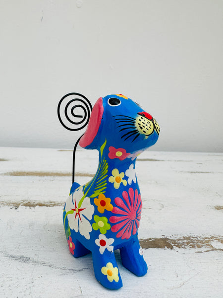 side view of flower dog in blue