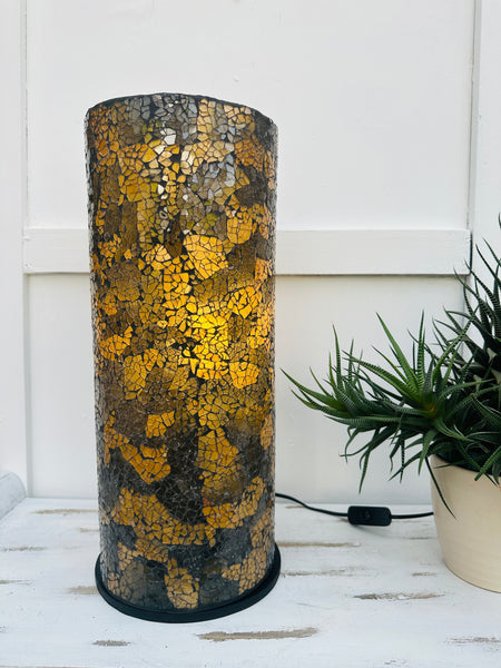 front view of mosaic cylinder lamp with light on