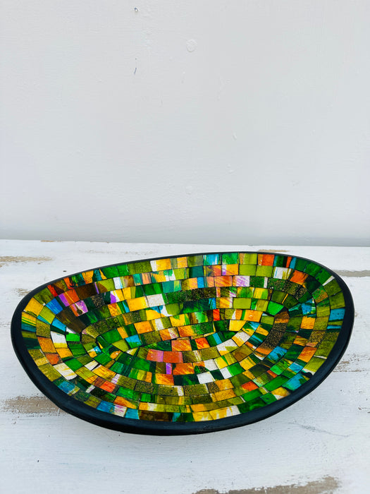 aerial view of mosaic oval bowl on white background