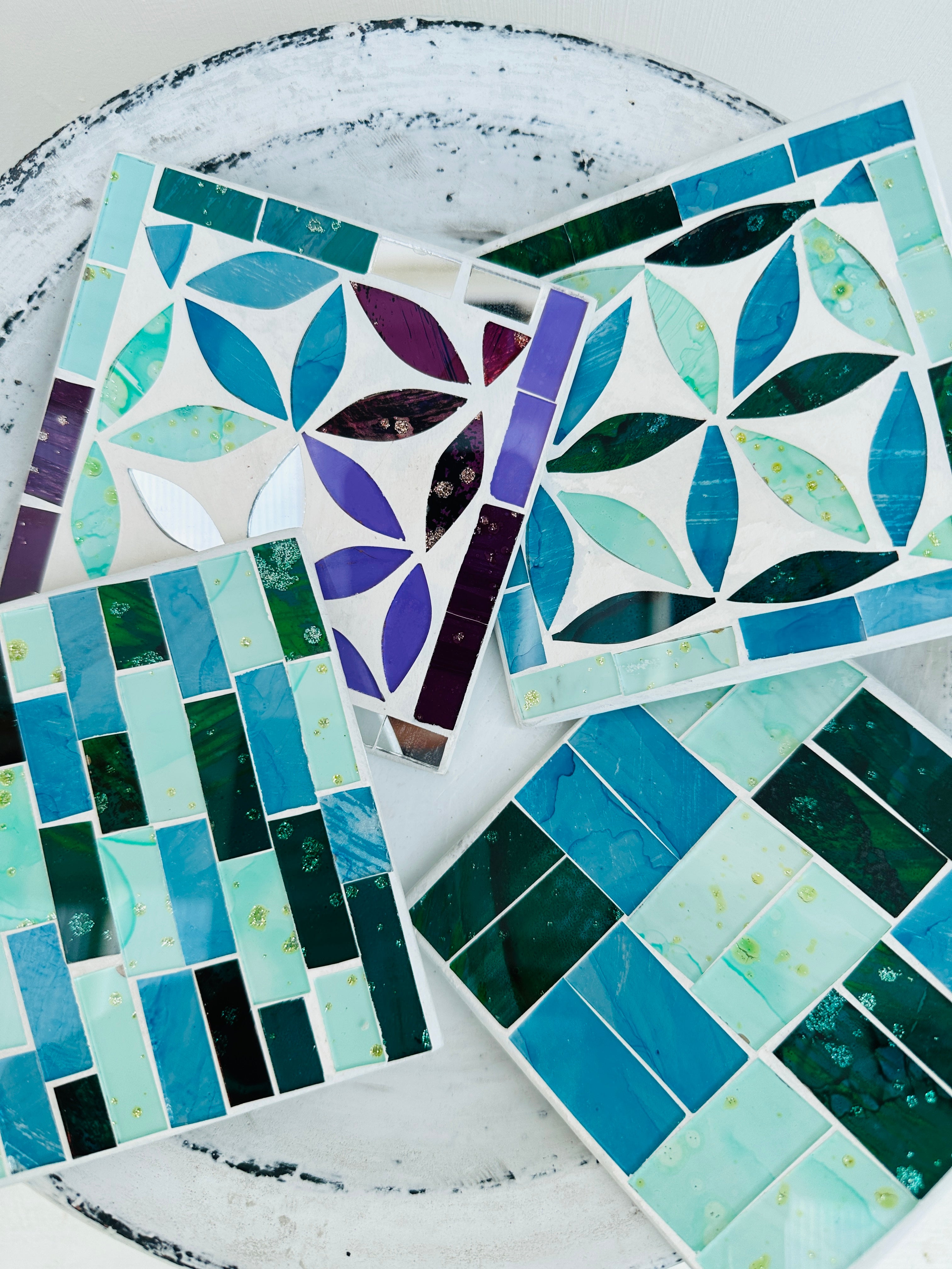 aerial view of assorted set of mosaic square coasters