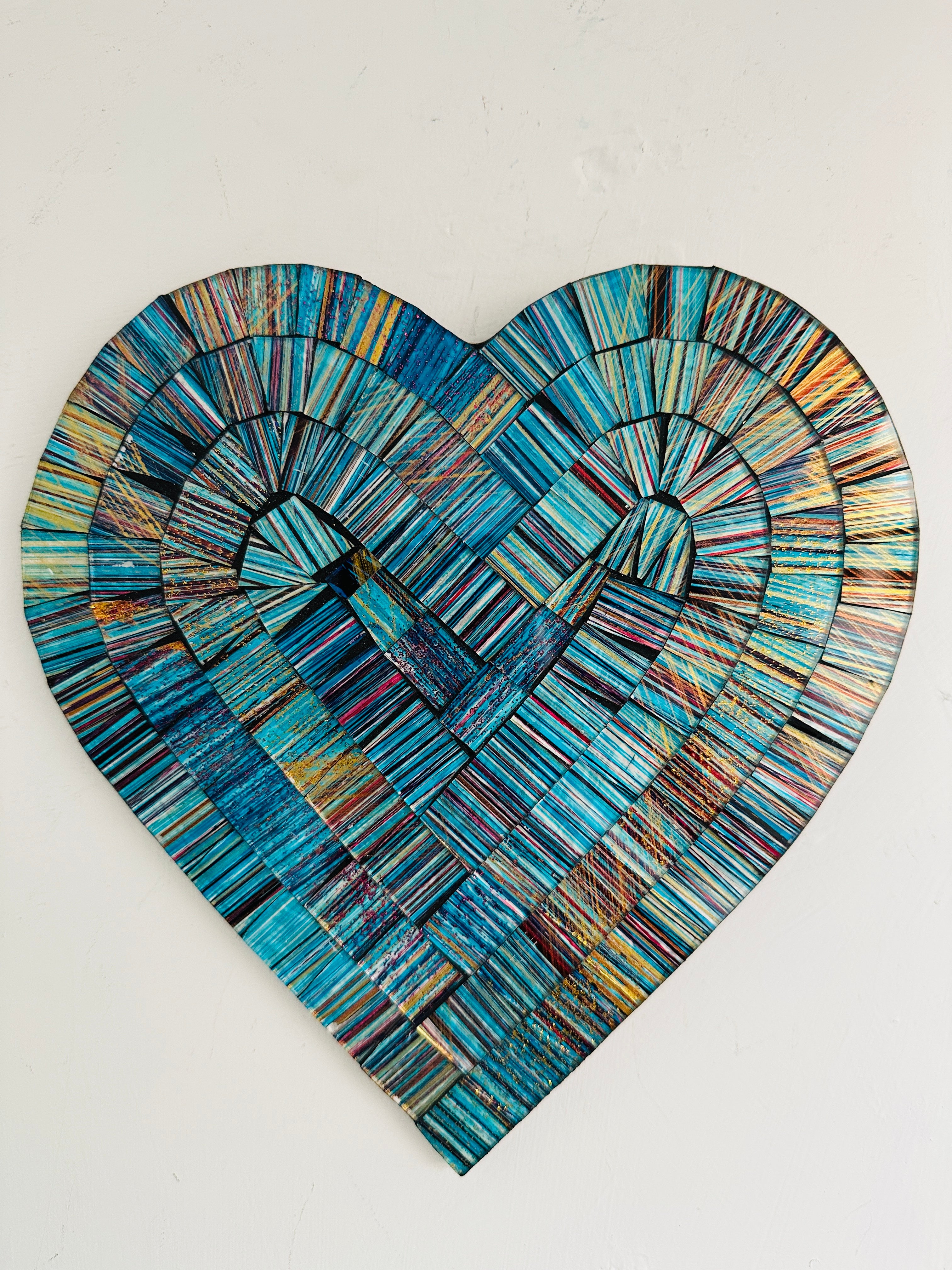 front view of mosaic heart in blue
