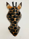 front view of wood giraffe mask