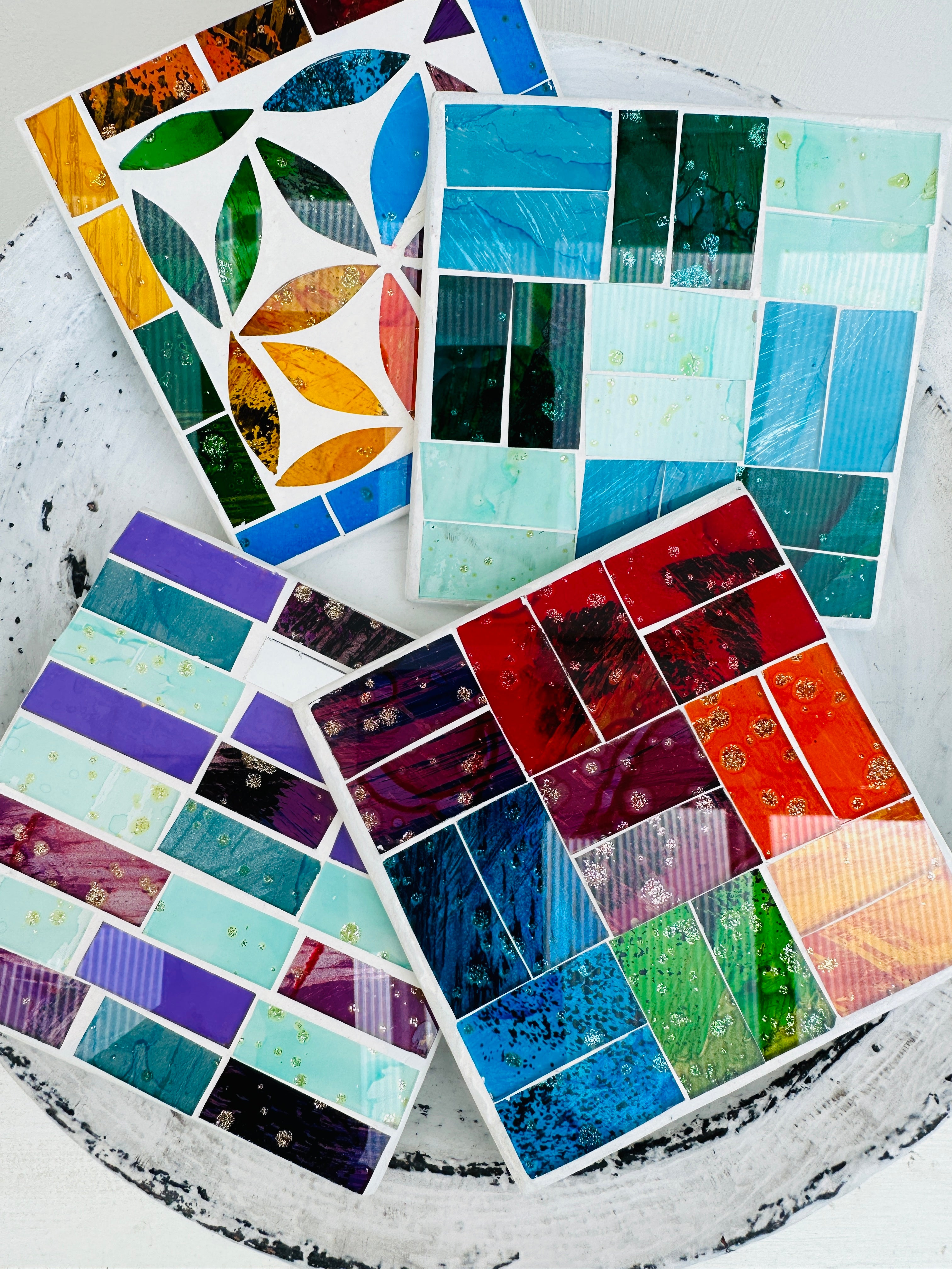 aerial view of assorted set of mosaic square coasters