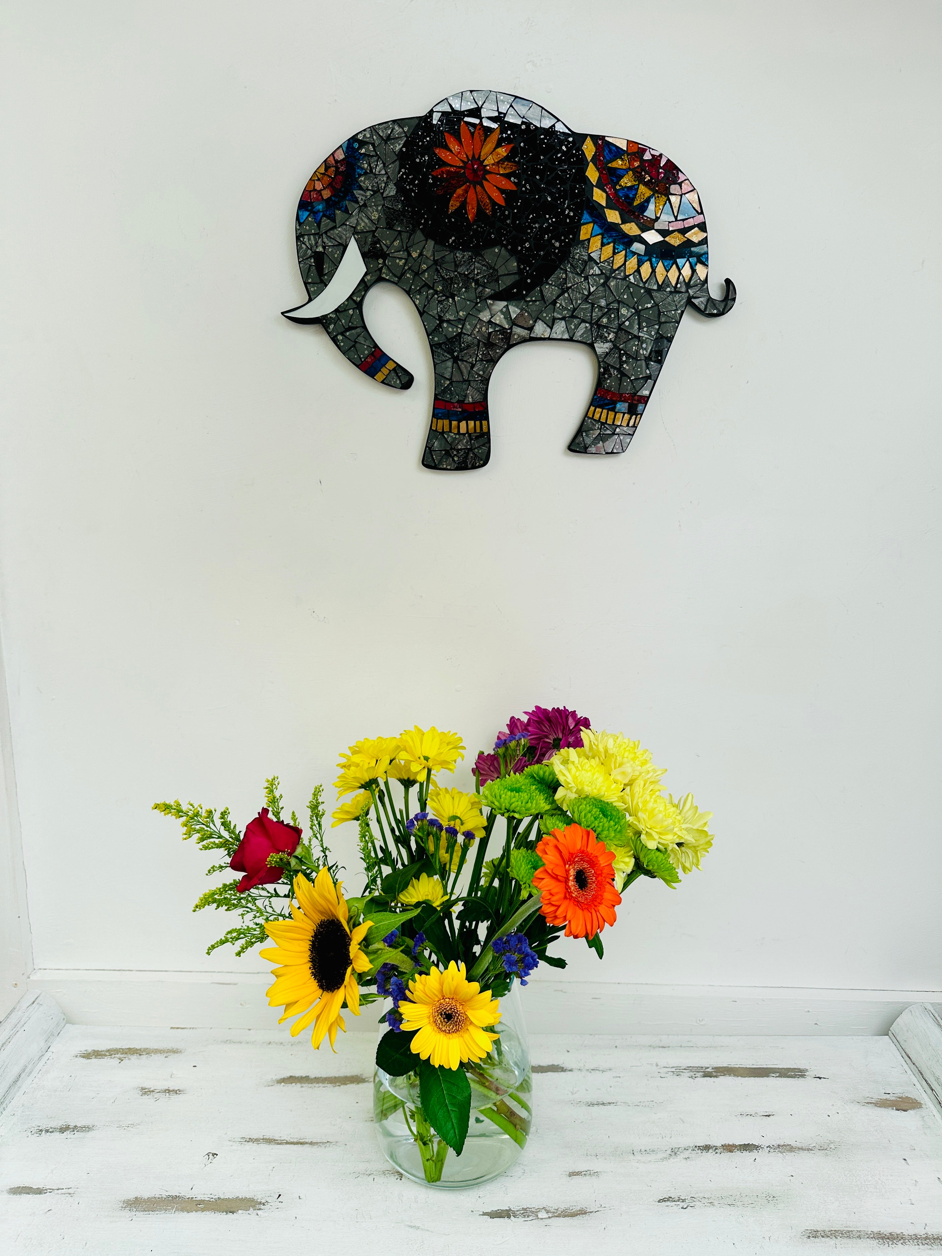 display view of mosaic elephant on wall