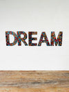 front view of mosaic DREAM on the wall