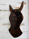 aerial base view of wooden giraffe mask
