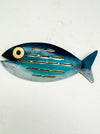 front view of mottled fish in blue