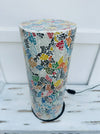 close up of glass mosaic cylinder lamp with light off