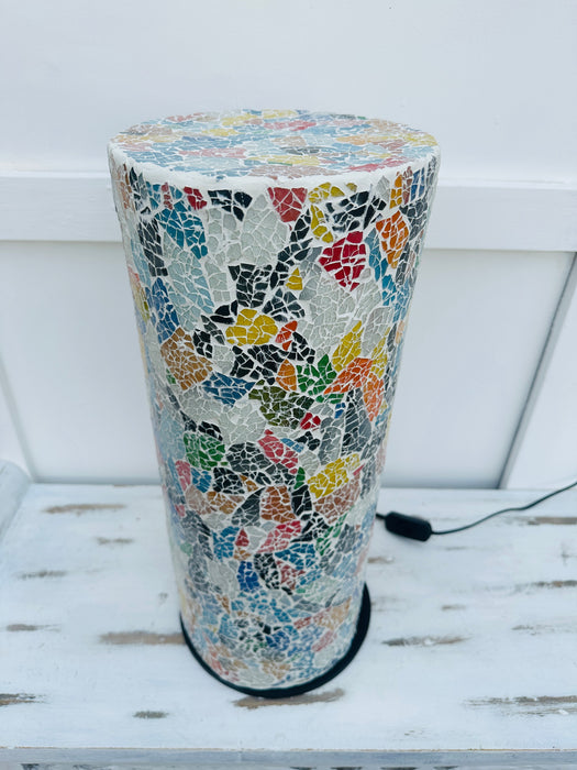 close up of glass mosaic cylinder lamp with light off