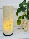 display view of mosaic cylinder lamp with light on