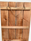 back view of wooden sign