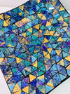 Top view of large handmade mosaic square plate showing detailed blue and cyan glass pattern in geometric layout.